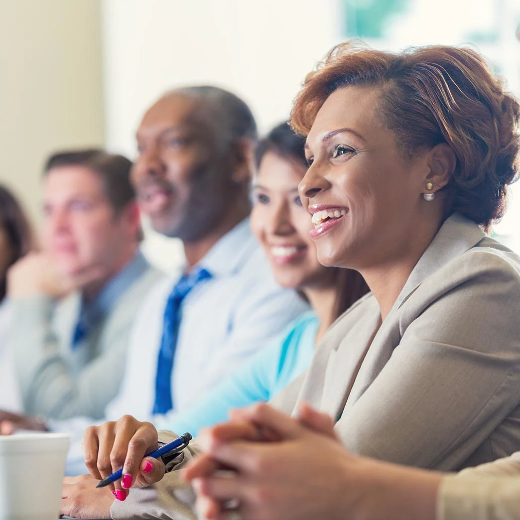 Research leaders sitting in a row