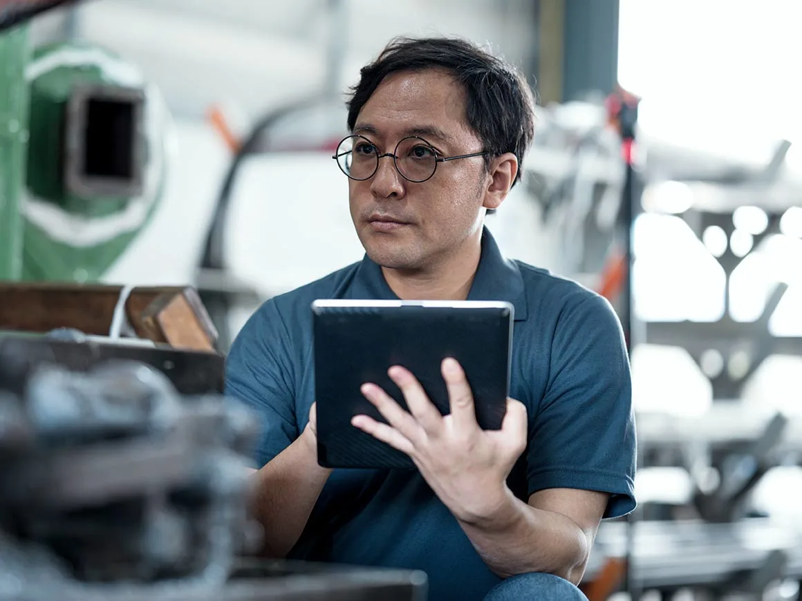 Engineer monitoring a machine